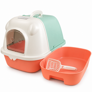 Arenero Frida Pets con bandeja naranja extraída y pala